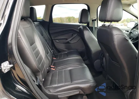 2017 Ford Escape Titanium z USA, uszkodzony, nr VIN 1FMCU0J90HUB91143